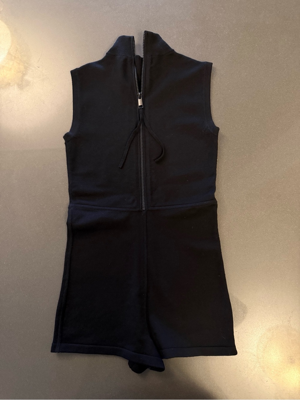 Michael Kors Collection Black Sleeveless One-Piece Romper with Zip Front.